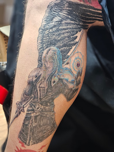Explore marine corps sleeve tattoo ideas, creative tattoo ideas in Winston, available at Recovery Tattoo Co. L.L.C.