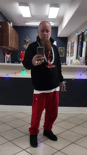 Explore mens tricep tattoo ideas, creative tattoo ideas in Auburn, available at Against All Odds Tattoo