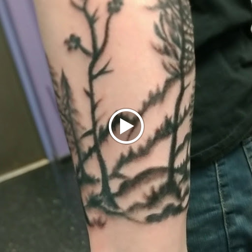 Explore good omens tattoo ideas, creative tattoo ideas in Spartanburg, available at The Gallery Tattoo Shop Spartanburg