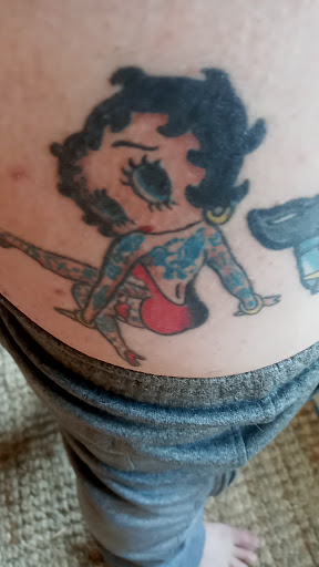 Explore mask tattoo ideas, creative tattoo ideas in Westminster, available at Westminster Tattoo Company