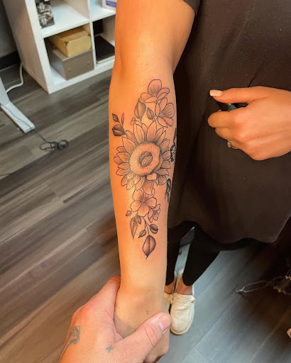 Explore mother and son tattoos ideas, creative tattoo ideas in Orange Park, available at Big City Tattoo and Piercing