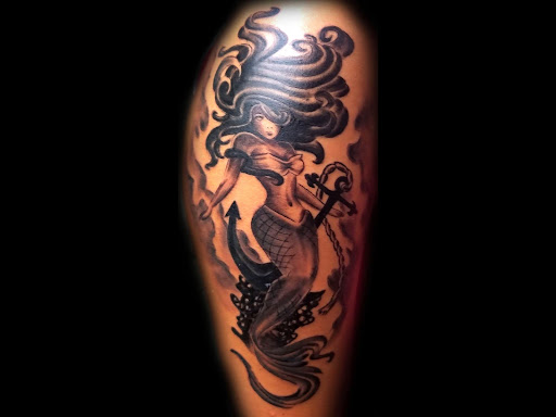 Explore back of shoulder tattoo ideas, creative tattoo ideas in Fairfax, available at Comes A Time Tattoo