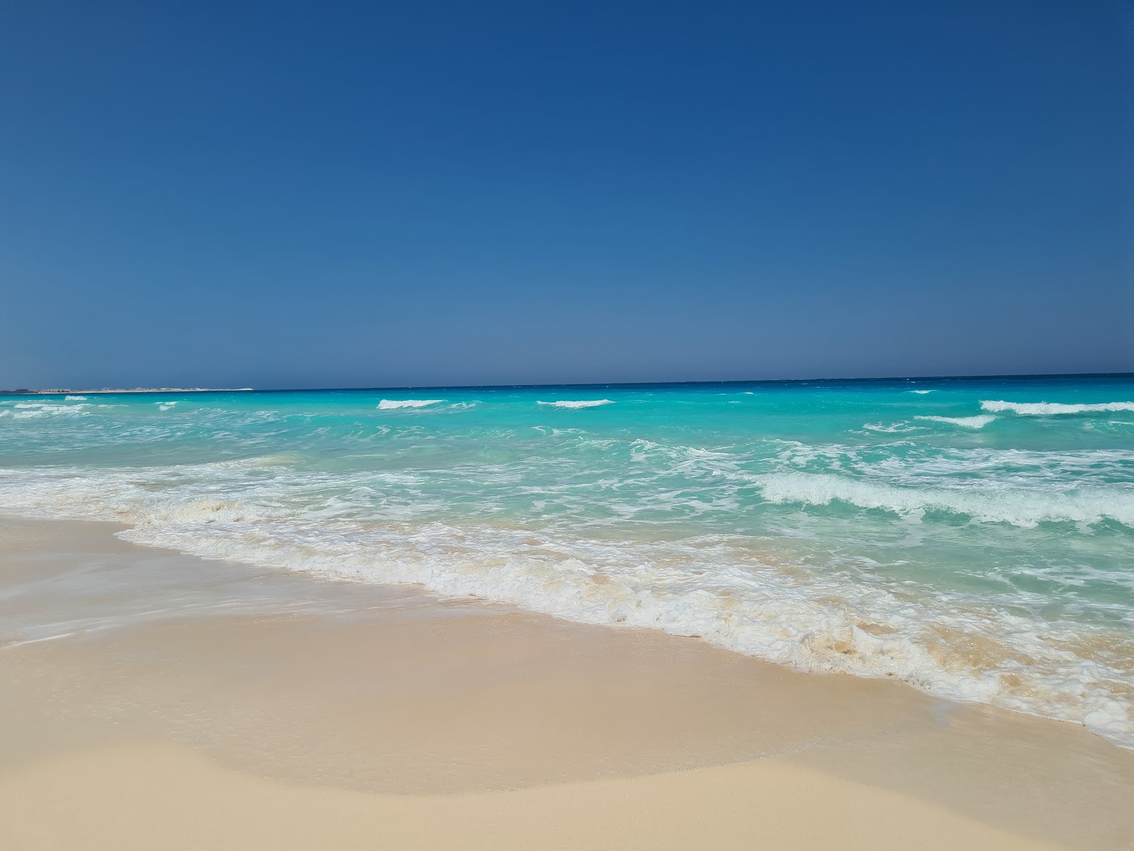 Dora Al Abyad Beach的照片 和解