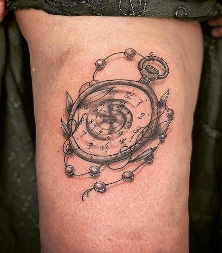 Explore men's back of neck tattoo ideas, creative tattoo ideas in Milwaukee, available at Bay Street Tattoo Co.