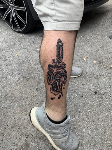 Explore snake tattoo ideas for guys, creative tattoo ideas in Gadsden, available at Zekez Inkz Tattoos & Piercings