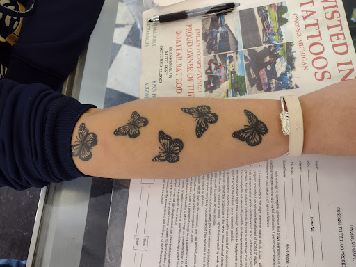 Explore monkey tattoo ideas, creative tattoo ideas in Owosso, available at Twisted ink tattoo