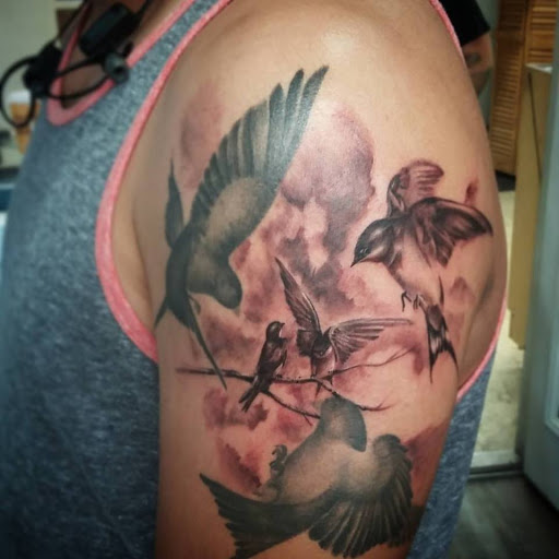 Explore girly half sleeve tattoo ideas for females, creative tattoo ideas in Garland, available at Rock Ink Tattoos