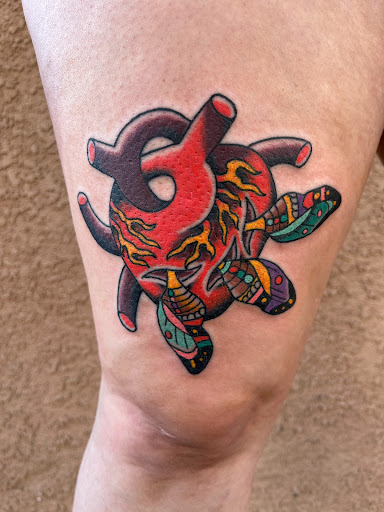 Explore simple motorcycle tattoo ideas, creative tattoo ideas in Albuquerque, available at Holy Fool Tattoo Club