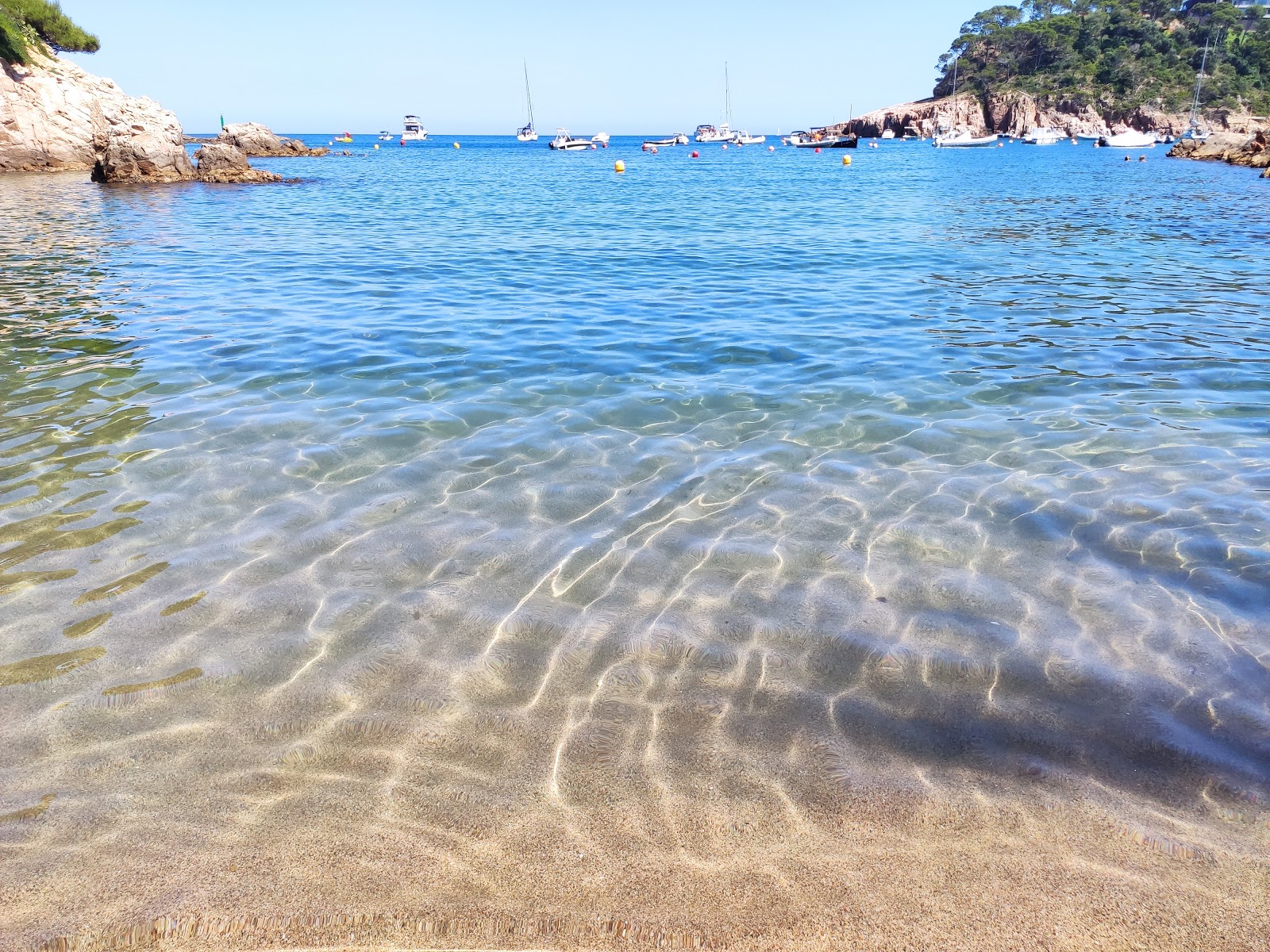 Photo of Platja de Fornells with turquoise pure water surface