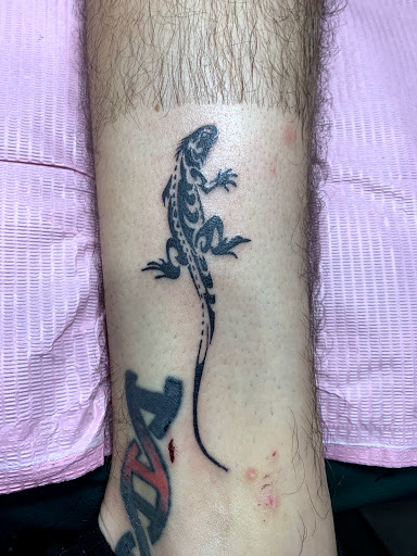 Find animal neck tattoo ideas for your next unique tattoo in Cape Coral at UNRIVALED INK