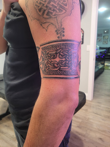 Explore rip sister tattoo ideas, creative tattoo ideas in Navarre, available at Ocean Wave Tattoo