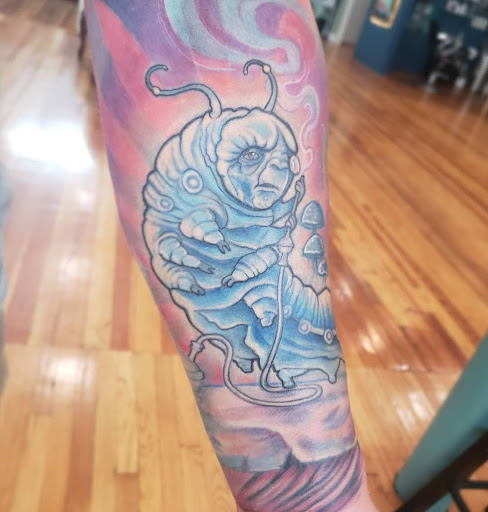 Explore fine line hand tattoo ideas, creative tattoo ideas in Saint Louis, available at Alchemy Tattoo Collective - Central West End