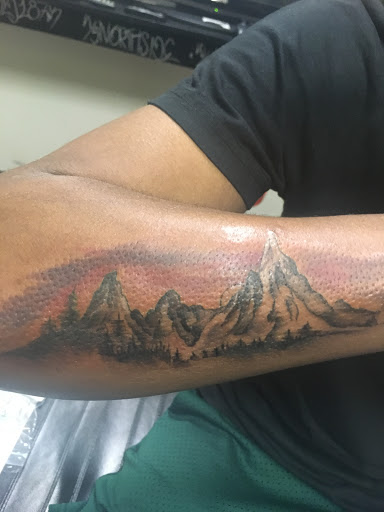 Explore head tattoo ideas, creative tattoo ideas in Savannah, available at Tatlyfe Studios