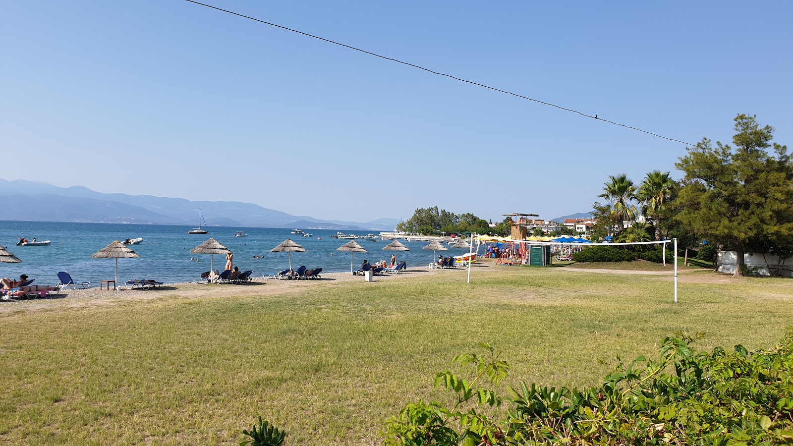 Fotografie cu Agios Panteleimonas - locul popular printre cunoscătorii de relaxare