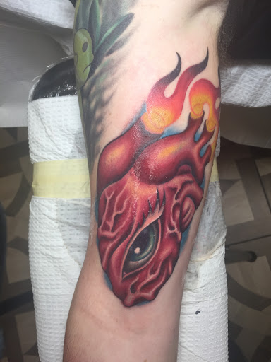 Explore cross sleeve tattoo ideas, creative tattoo ideas in Jacksonville, available at Electric Legacy Tattoo