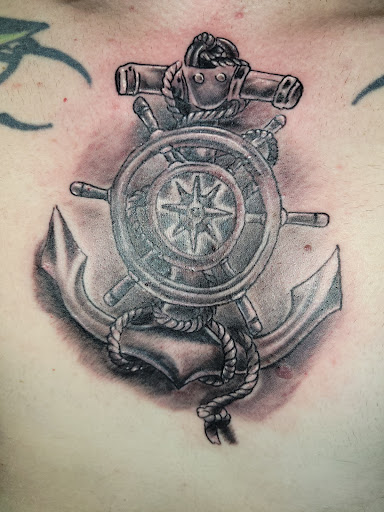 Explore thin tattoo ideas, creative tattoo ideas in Angola, available at Hoodlum Ink