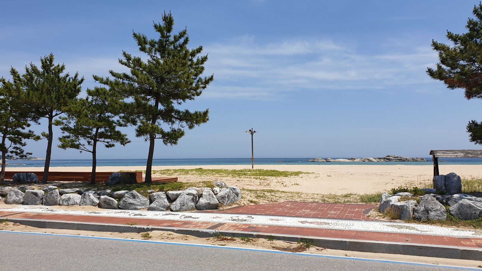 Fotografija Sampo Beach in naselje