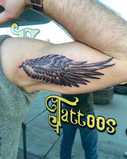 Explore clock tattoo idea, creative tattoo ideas in Shelbyville, available at Stage Left Tattoo and Piercing