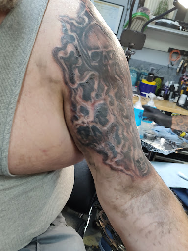 Explore back tattoo ideas for guys, creative tattoo ideas in Colton, available at Vengeance Ink Tattoo & body piercing