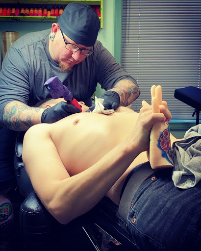 Find poppy tattoo ideas for your next unique tattoo in Meridian at Creative Pain Tattoo Studio