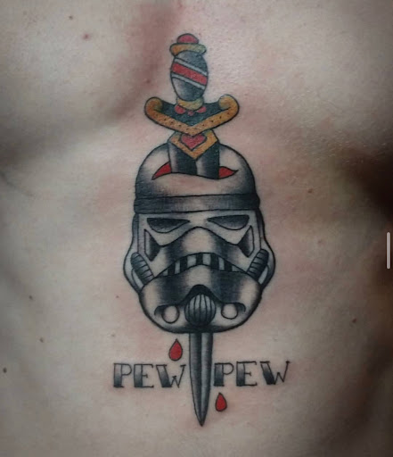 Explore chainsaw man tattoo ideas, creative tattoo ideas in Lander, available at Blackblood Tattoo and Piercing