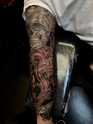 Explore lion cub tattoo ideas, creative tattoo ideas in Addison, available at Cat Tattoo