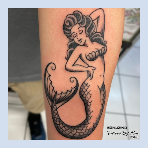 Explore ripped skin tattoo ideas, creative tattoo ideas in Miami, available at Tattoos by Lou Miami - Kendall