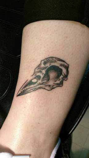 Explore ghost band tattoo ideas, creative tattoo ideas in Bowling Green, available at Taboo Tattoos and Piercings