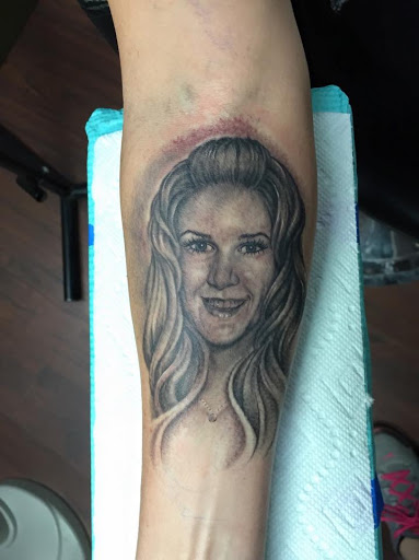 Explore small name tattoo ideas, creative tattoo ideas in Peoria, available at Iron Key Tattoo Studio Inc.