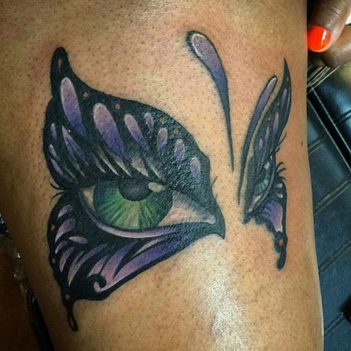 Explore hood tattoo ideas for men, creative tattoo ideas in Brooklyn, available at Graffiti Ink Tattoos