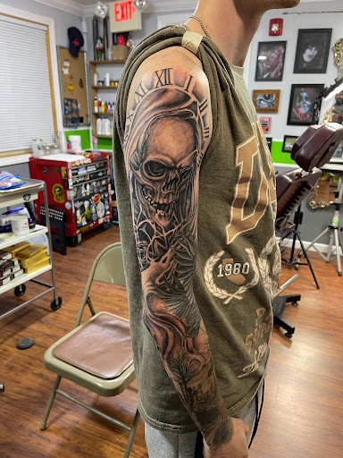 Find luna tattoo ideas for your next unique tattoo in Harrisville at Cloud 9 Tattoo Company