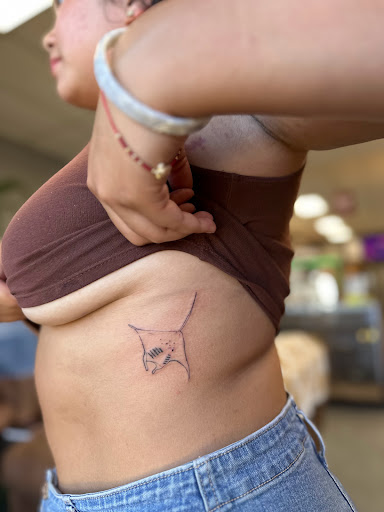 Explore packer tattoo ideas, creative tattoo ideas in Kailua Kona, available at Kaeo Hawaii Tattoo & Creative Studio