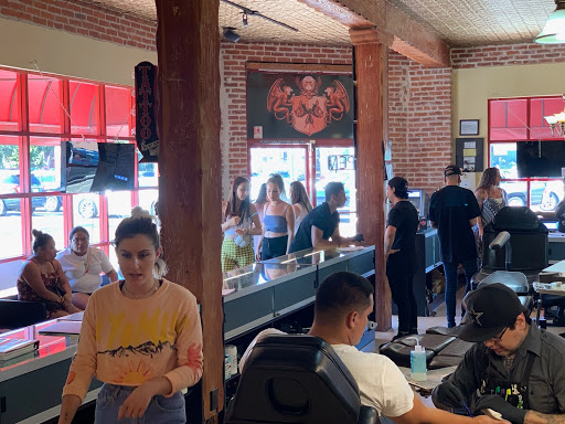 Explore tattoo ideas for fathers, creative tattoo ideas in Venice, available at Ink Monkey Tattoo and Piercing