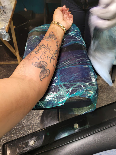 Explore flag tattoo ideas, creative tattoo ideas in Jacksonville, available at Renegade Art Studio LLC