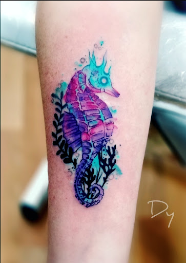 Explore cover up tattoo ideas for names, creative tattoo ideas in Benton, available at Spectrum Tattoo