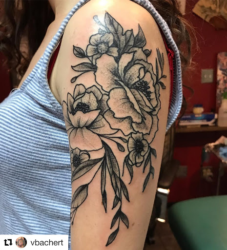 Find between breast tattoo ideas for your next unique tattoo in Boulder at Claw and Talon Tattoo