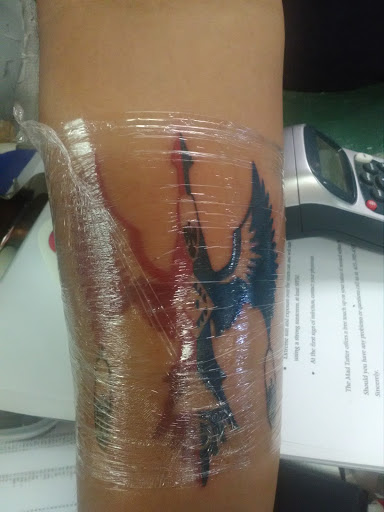 Explore ballerina tattoos ideas, creative tattoo ideas in Shawnee, available at The Mad Tatter