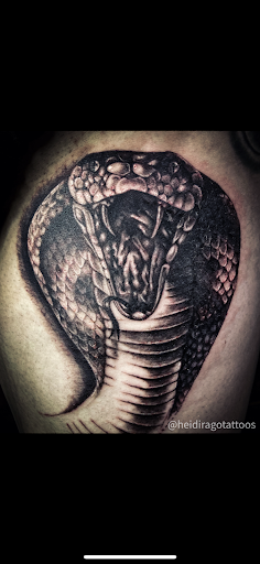 Explore barbed wire tattoo ideas, creative tattoo ideas in Oak Forest, available at Silver Raven Tattoos