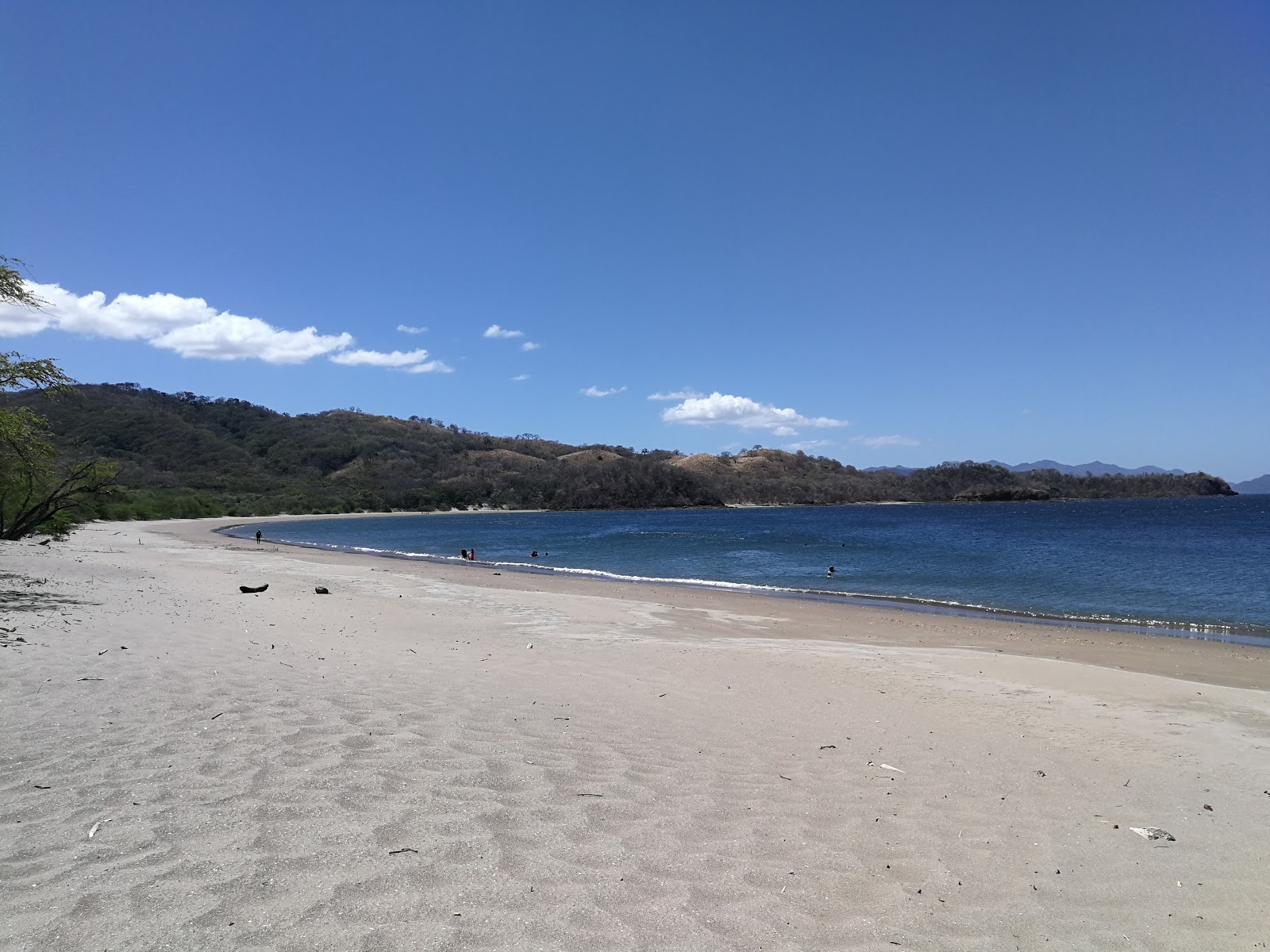 Junquillal beach的照片 带有明亮的沙子表面