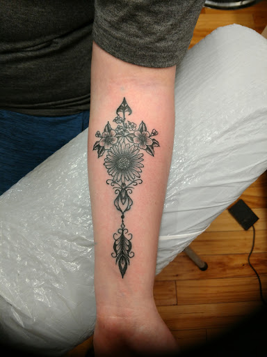 Explore lotus tattoo ideas, creative tattoo ideas in Morristown, available at Ink Dreams Tattoo