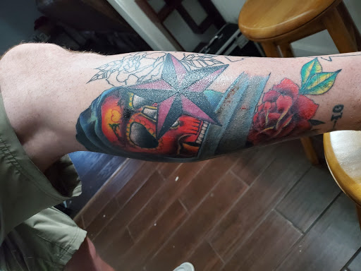 Explore aster flower tattoo ideas, creative tattoo ideas in Sidney, available at Spectrum Tattoo Studio