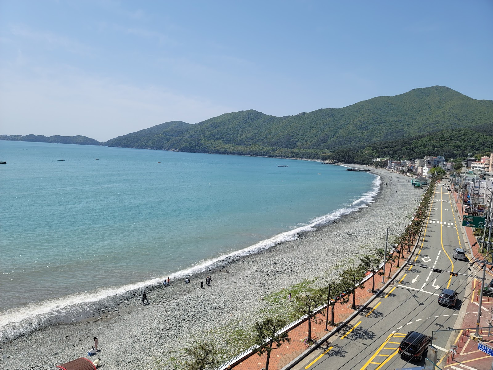 Photo of Hakdong Black Pearl Beach with long straight shore