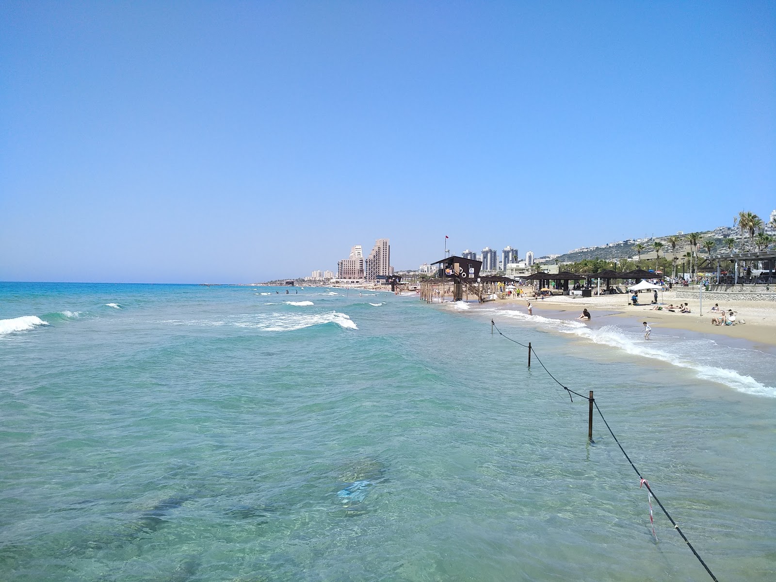 Foto van Zamir beach met helder zand oppervlakte