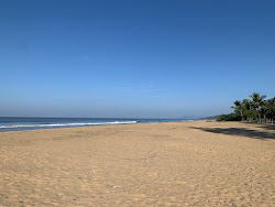 Foto von Gangekolla beach und die siedlung