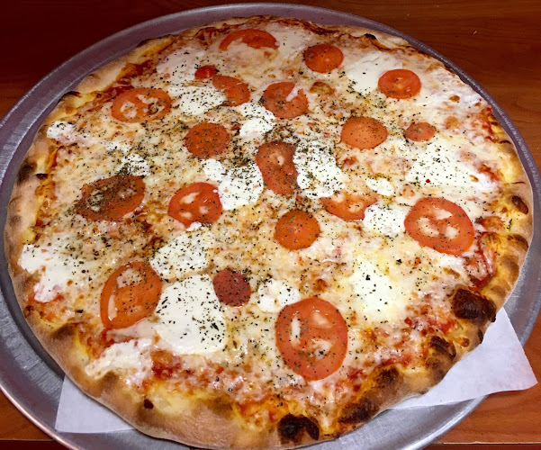 #1 best pizza place in Austin - Niki's Pizza