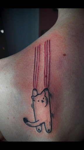 Explore playstation tattoo ideas, creative tattoo ideas in North Tonawanda, available at Dark Side Ink Tattoo Studio