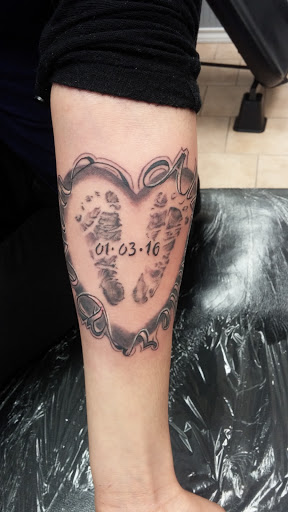 Tattoo Shop «magnum opus tattoo company», reviews and photos, 1817 Padre Blvd #4, South Padre Island, TX 78597, USA