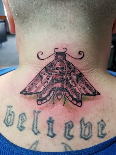 Explore female chest piece tattoo ideas, creative tattoo ideas in Aberdeen, available at Shrunken Head Tattoos