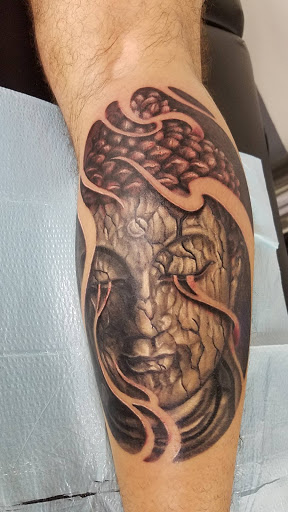 Tattoo Shop «Metropolis Tattoo and Fine Art», reviews and photos, 721 S Elm St Suite 109, Denton, TX 76201, USA