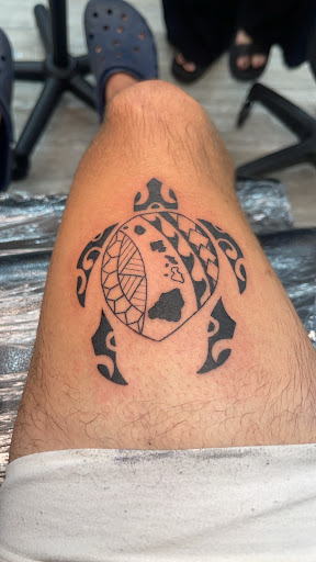 Explore puzzle piece tattoo ideas, creative tattoo ideas in Lahaina, available at Banyan Tree Tattoo